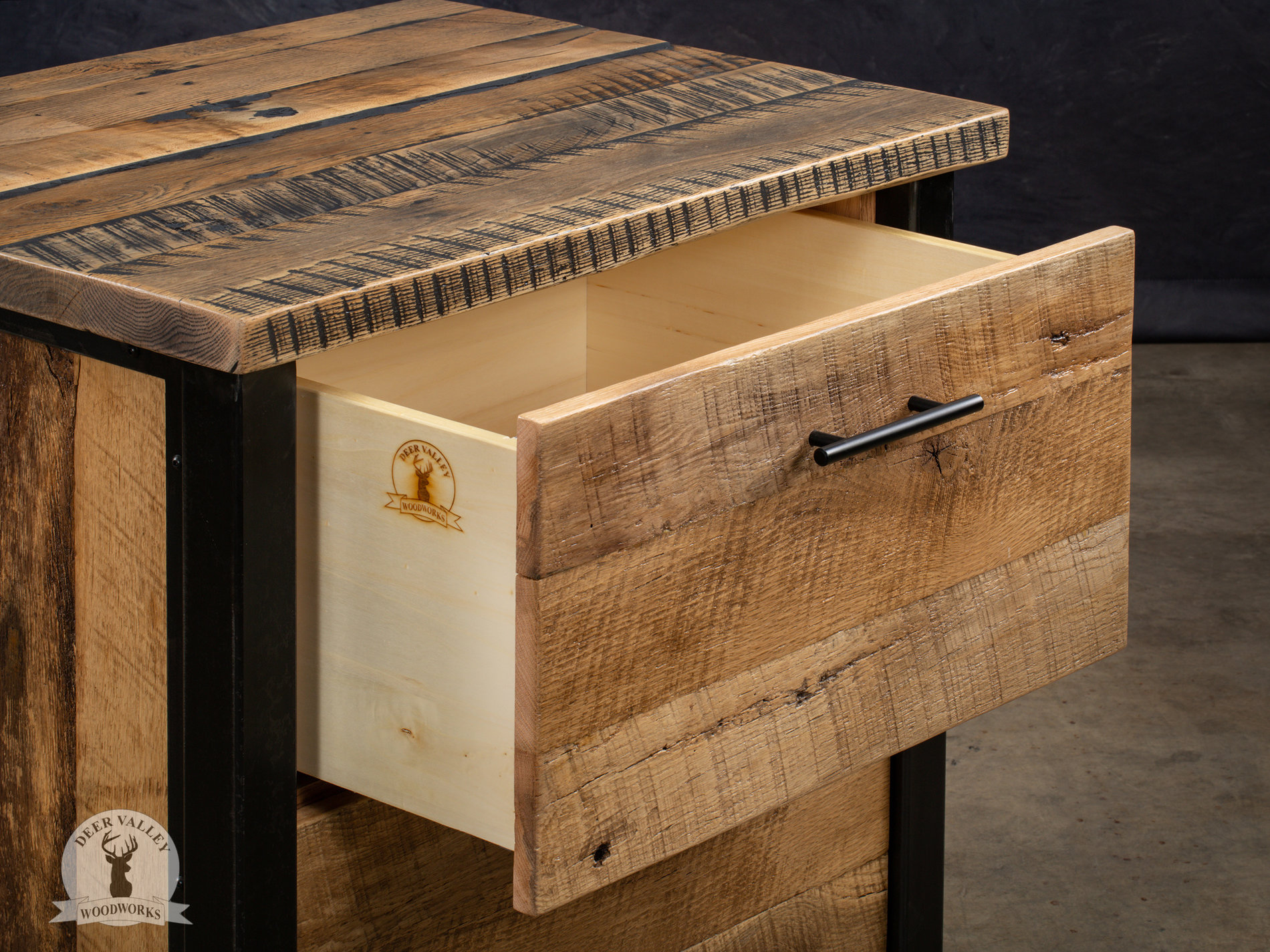 Closeup view of our reclaimed wood file cabinet, showing the top drawer open.