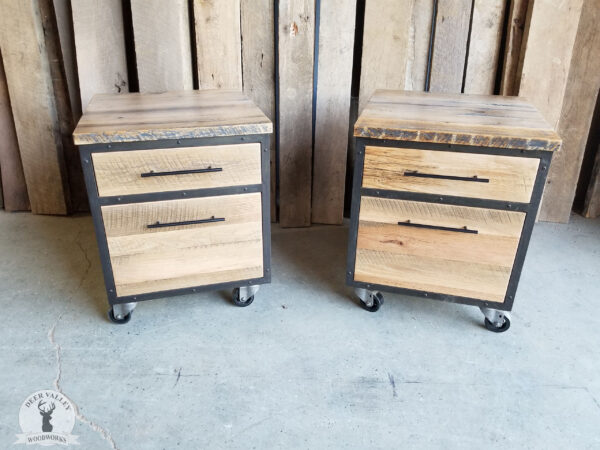 Rustic barnwood rolling file cabinets, both with a storage drawer and a deep drawer with an antiqued blackened steel frame surrounding it, made mobile by vintage casters.