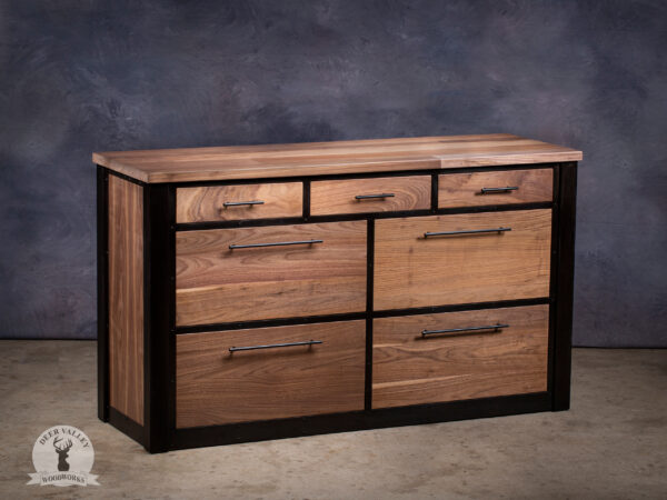Modern black walnut office credenza with a large countertop, three regular drawers, four file drawers and blackened welded steel legs and frame.