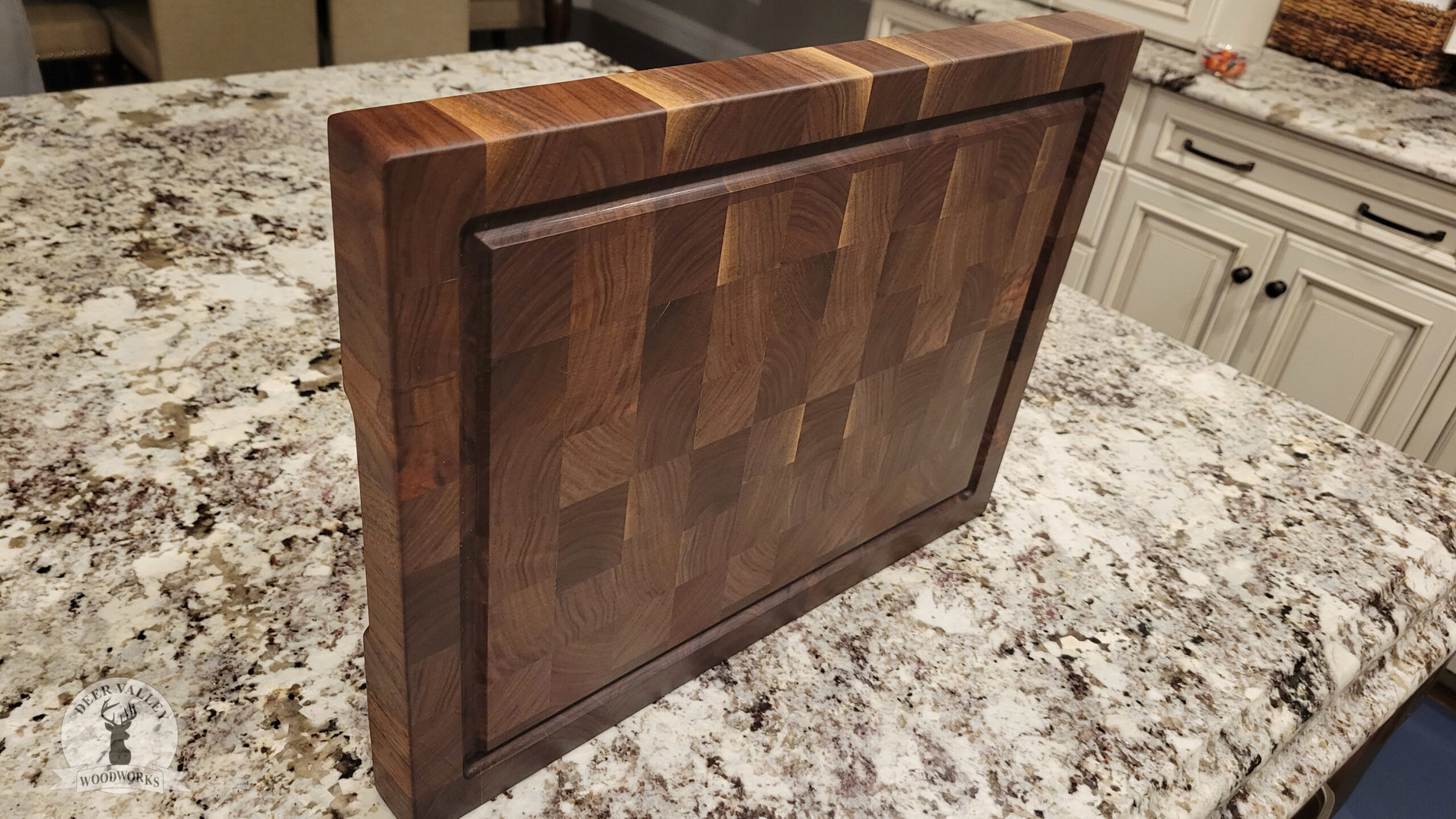 Extra large end-grain style walnut cutting board with juice grooves.