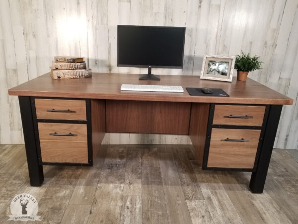 Modern executive's desk with a black walnut desktop, modesty panels, dual banks of drawers at each end, and industrial antique blackened welded steel legs.