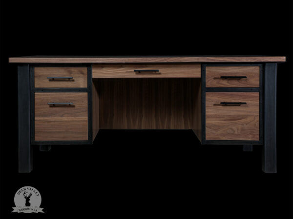 Modern black walnut executive's desk with large desktop, two regular drawers, two file drawers, center pencil drawer, modesty panels with blackened industrial welded steel legs and framework.