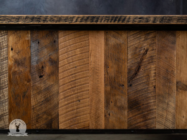 Closeup view of the barnwood modesty panel on our rustic barnwood corner desk, showing beautiful characteristics of the barnwood.