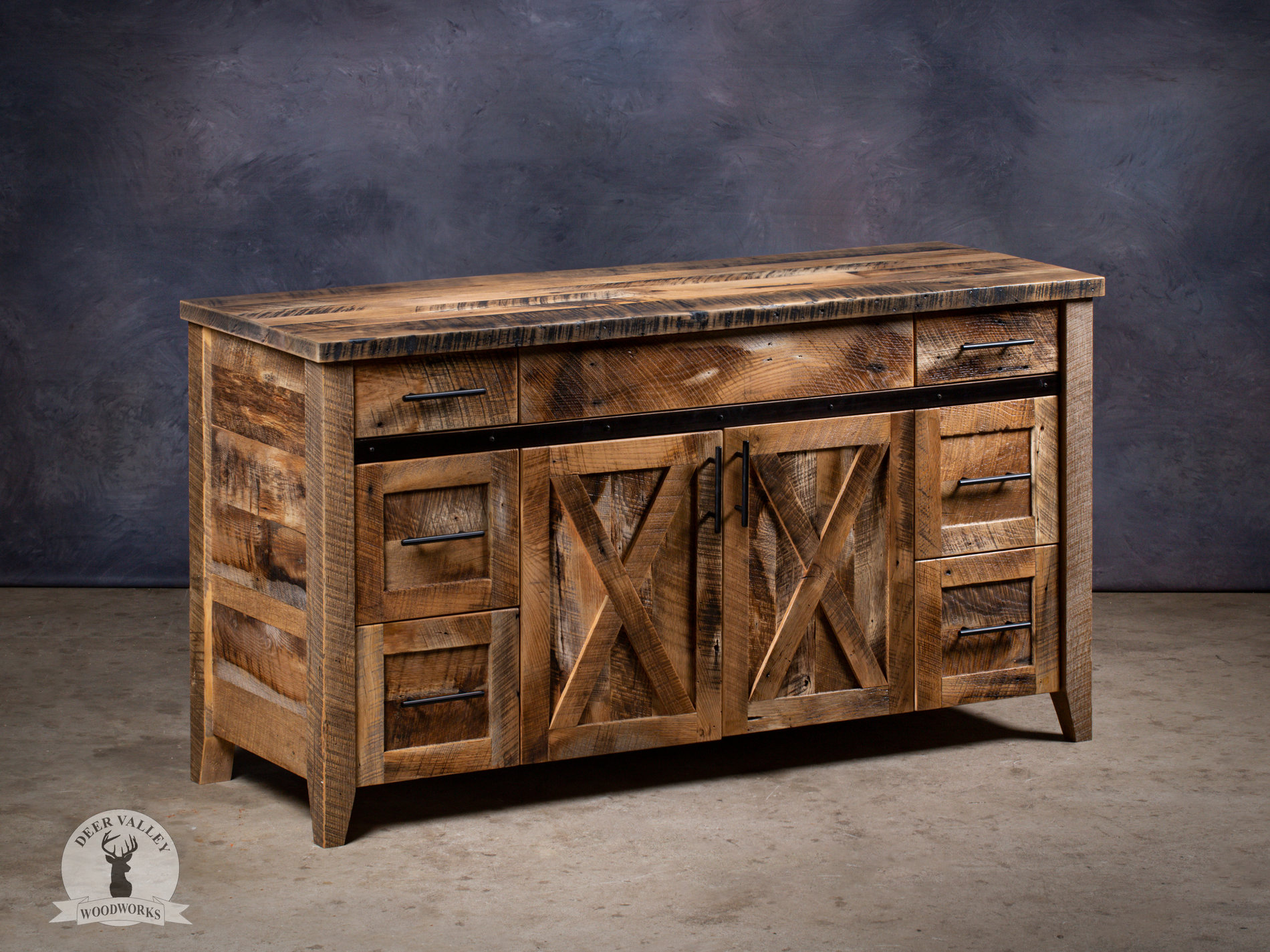 Authentic barnwood six drawer bathroom vanity with countertop, and cabinet doors with recessed center panels.