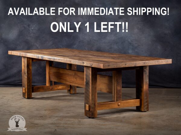Reclaimed barnwood farmhouse dining with a 2-1/2” tabletop and wedged tenons that connect the table legs to each other.