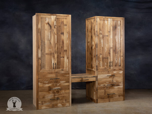 Huge reclaimed barnwood wardrobe cabinet showing a cabinet at each end with a makeup station connecting them in the middle.