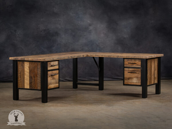 Rustic reclaimed wood corner desk with large desktop, dual drawer banks and blackened welded steel frame.