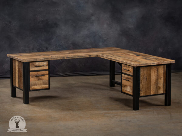 Reclaimed wood corner desk with large desktop, double drawer banks and antique blackened welded steel frame.